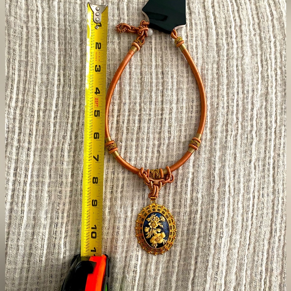Vintage choker necklace peachy  braided nylon chain with dangling cameo flower.